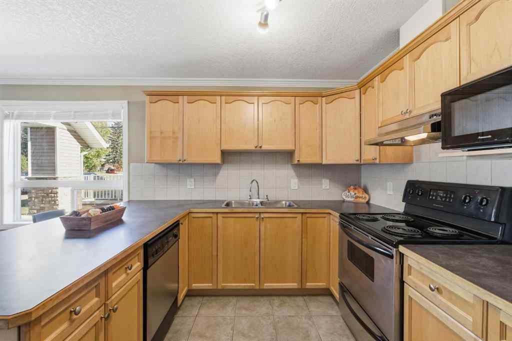 MLS® A2266383 - Unit #103 128 Centre Avenue  in East End Cochrane, Residential