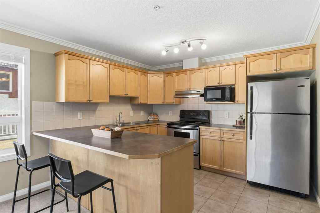 MLS® A2266383 - Unit #103 128 Centre Avenue  in East End Cochrane, Residential