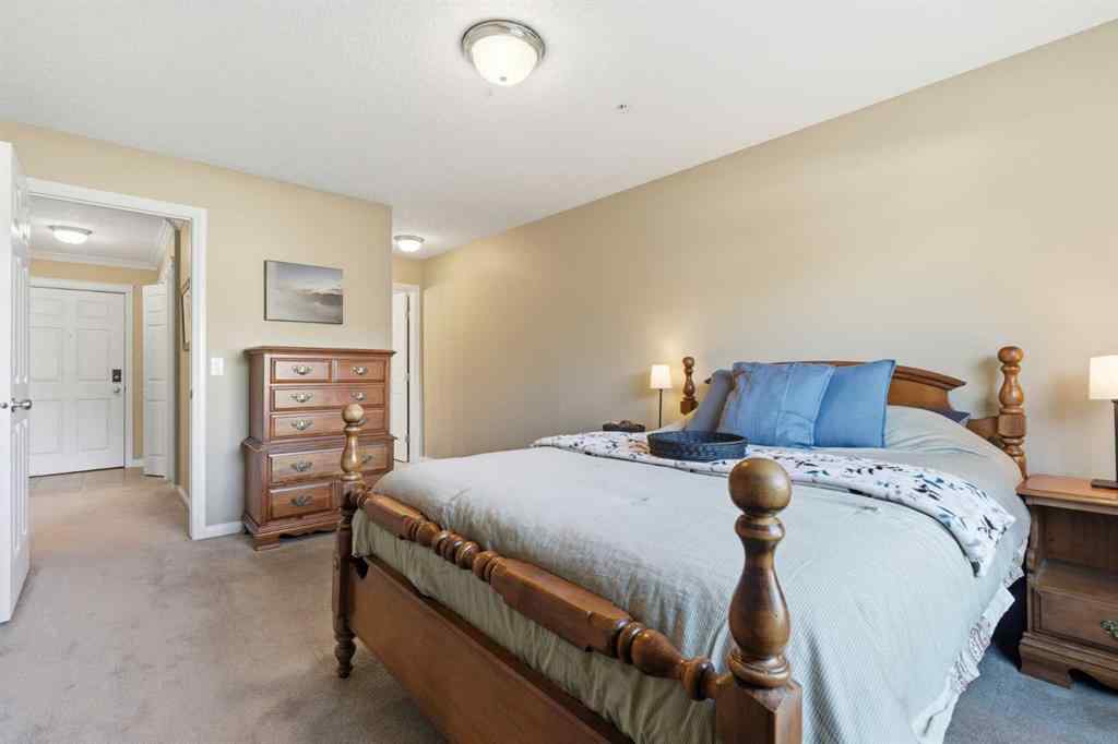 MLS® A2266383 - Unit #103 128 Centre Avenue  in East End Cochrane, Residential