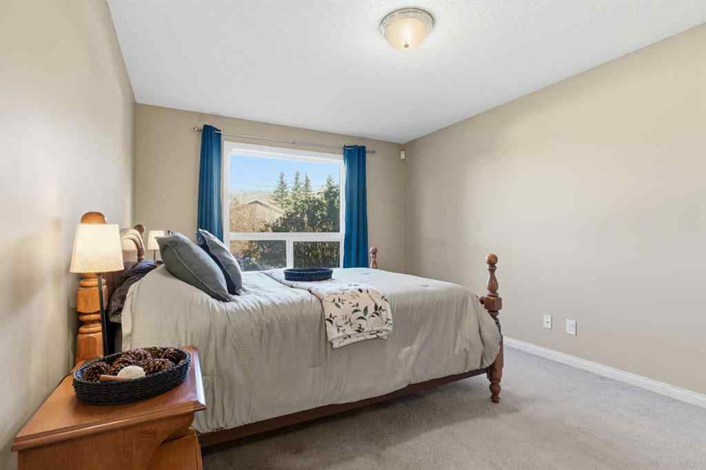 MLS® A2266383 - Unit #103 128 Centre Avenue  in East End Cochrane, Residential