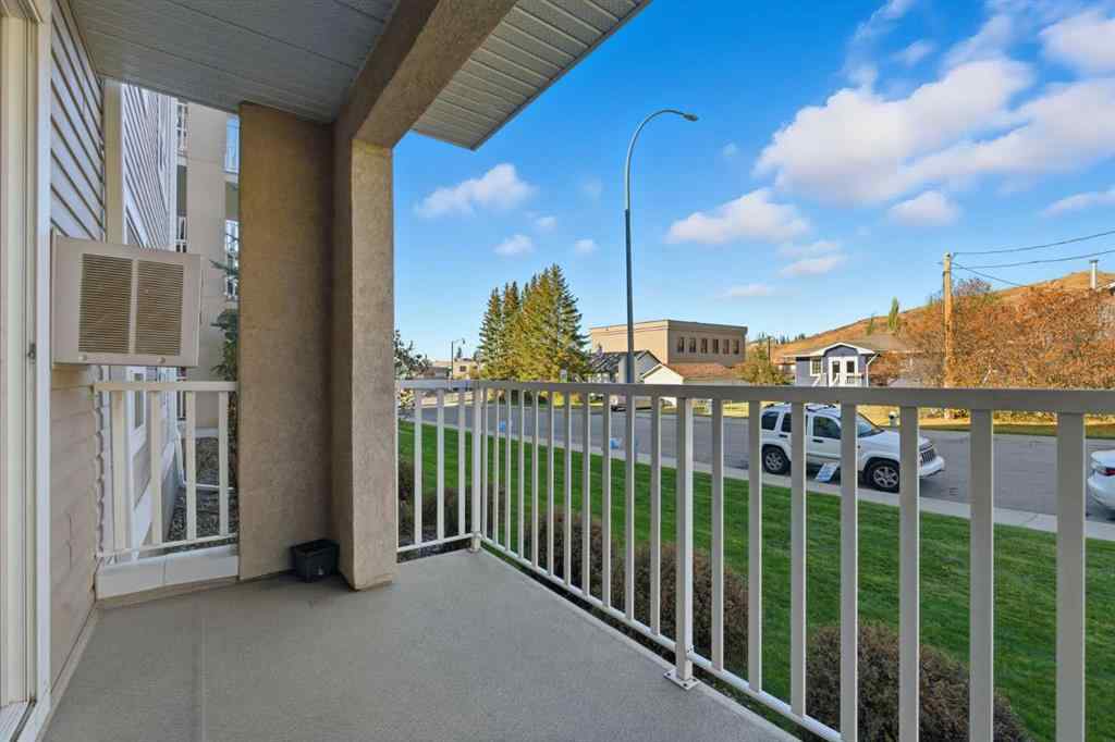 MLS® A2266383 - Unit #103 128 Centre Avenue  in East End Cochrane, Residential