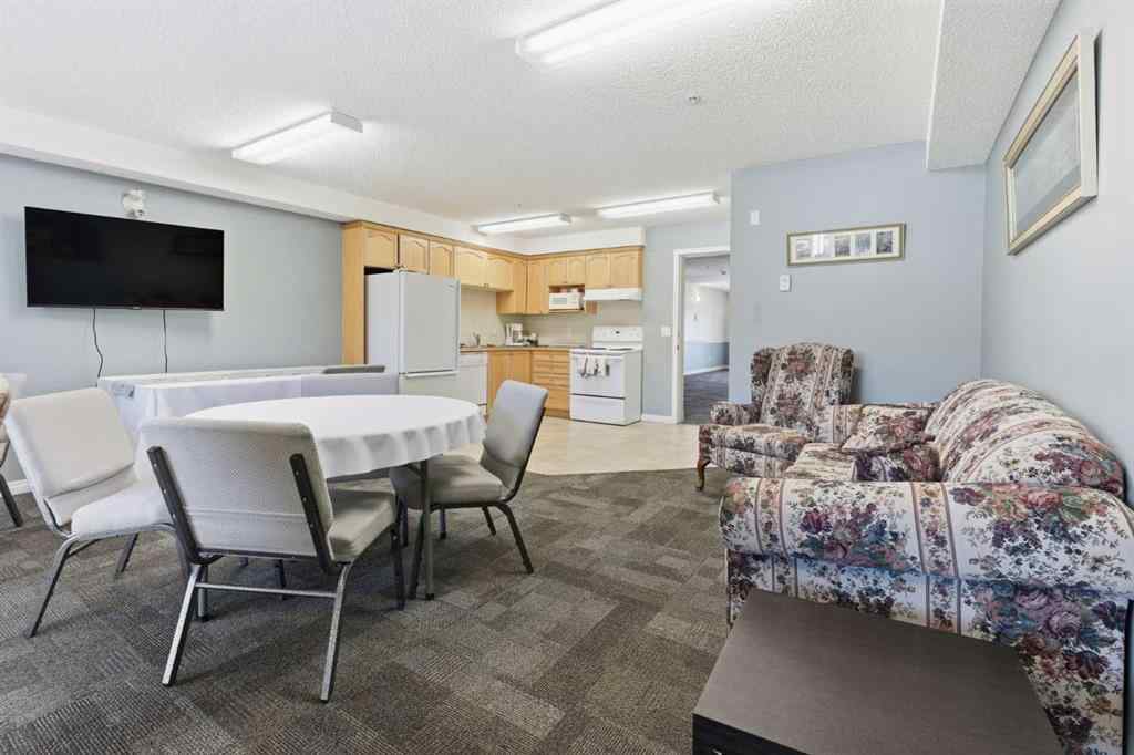 MLS® A2266383 - Unit #103 128 Centre Avenue  in East End Cochrane, Residential