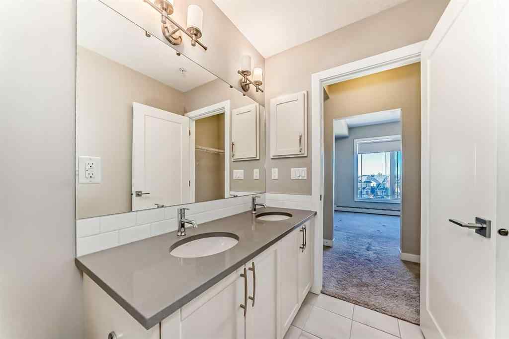 MLS® A2266411 - Unit ##305 150 Auburn Meadows Manor SE in Auburn Bay Calgary, Residential