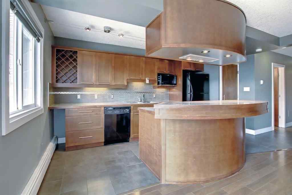 MLS® A2266440 - Unit #401 1730 7 Street SW in Lower Mount Royal Calgary, Residential