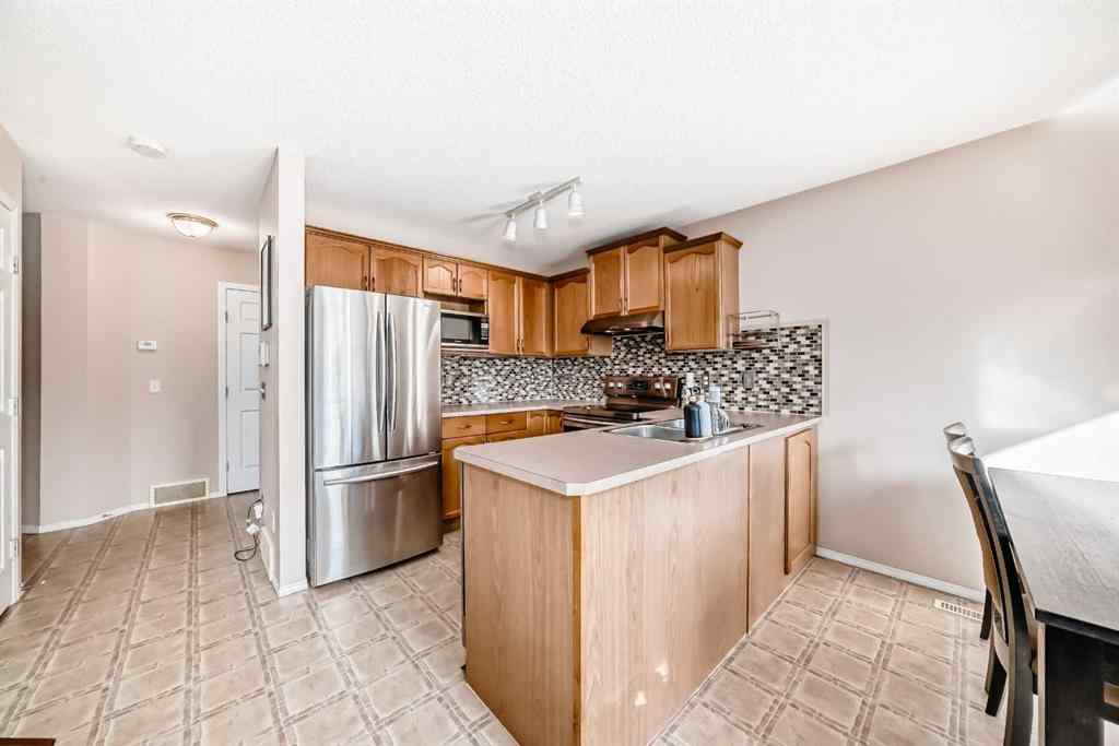 MLS® A2266444 - 238 Bridleridge Way SW in Bridlewood Calgary, Residential