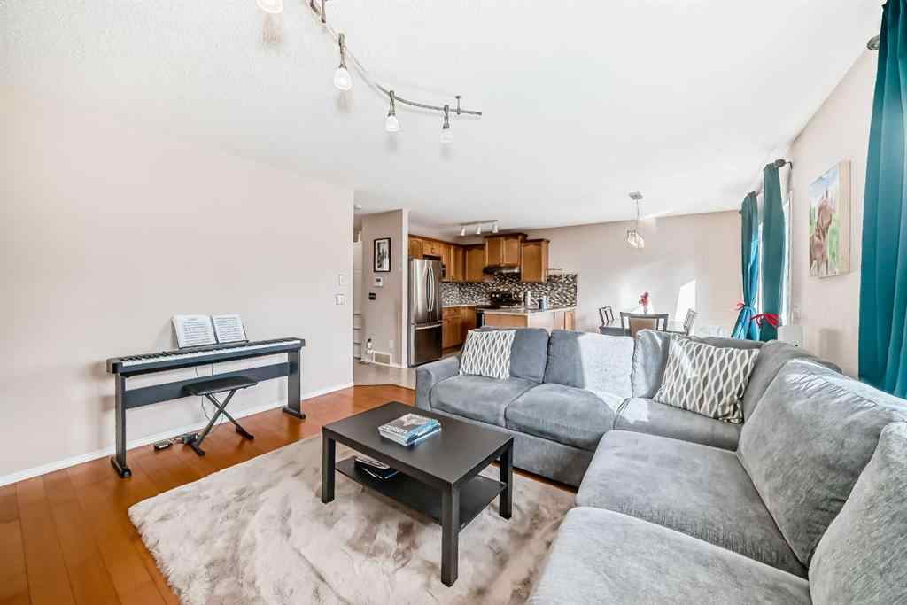 MLS® A2266444 - 238 Bridleridge Way SW in Bridlewood Calgary, Residential