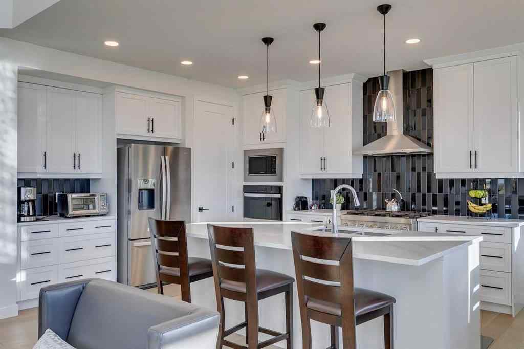 MLS® A2266458 - 794 Bluerock Way SW in Alpine Park Calgary, Residential