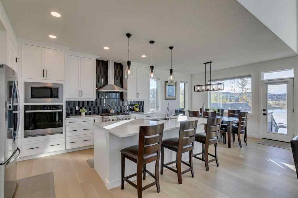 MLS® A2266458 - 794 Bluerock Way SW in Alpine Park Calgary, Residential