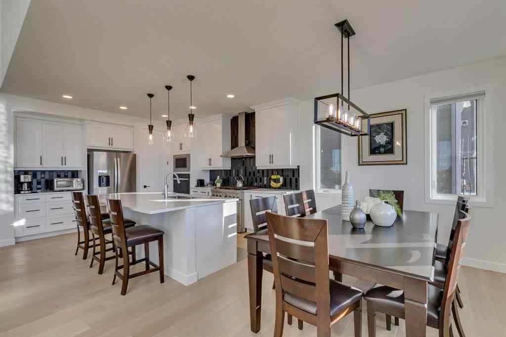 MLS® A2266458 - 794 Bluerock Way SW in Alpine Park Calgary, Residential