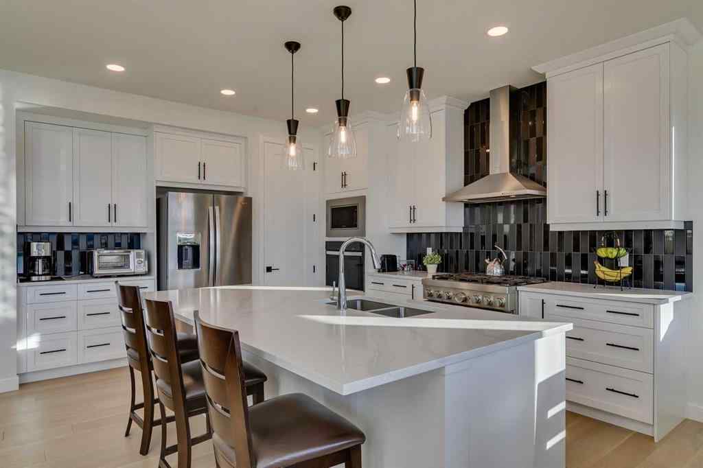 MLS® A2266458 - 794 Bluerock Way SW in Alpine Park Calgary, Residential