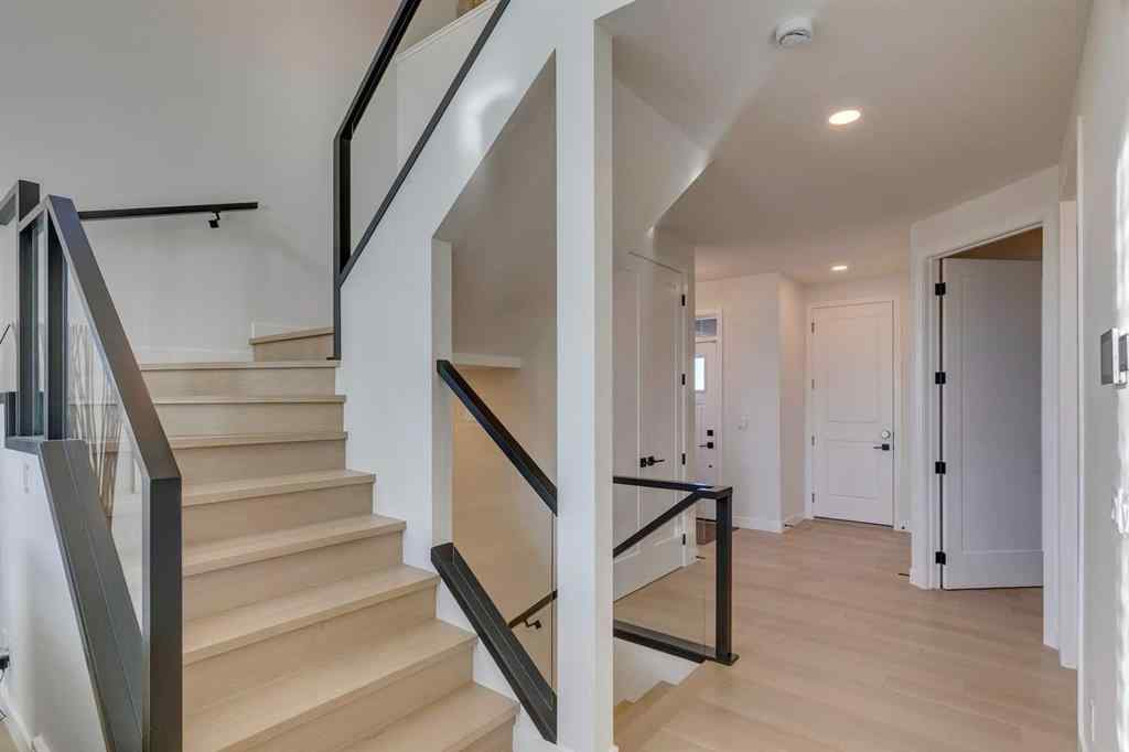 MLS® A2266458 - 794 Bluerock Way SW in Alpine Park Calgary, Residential