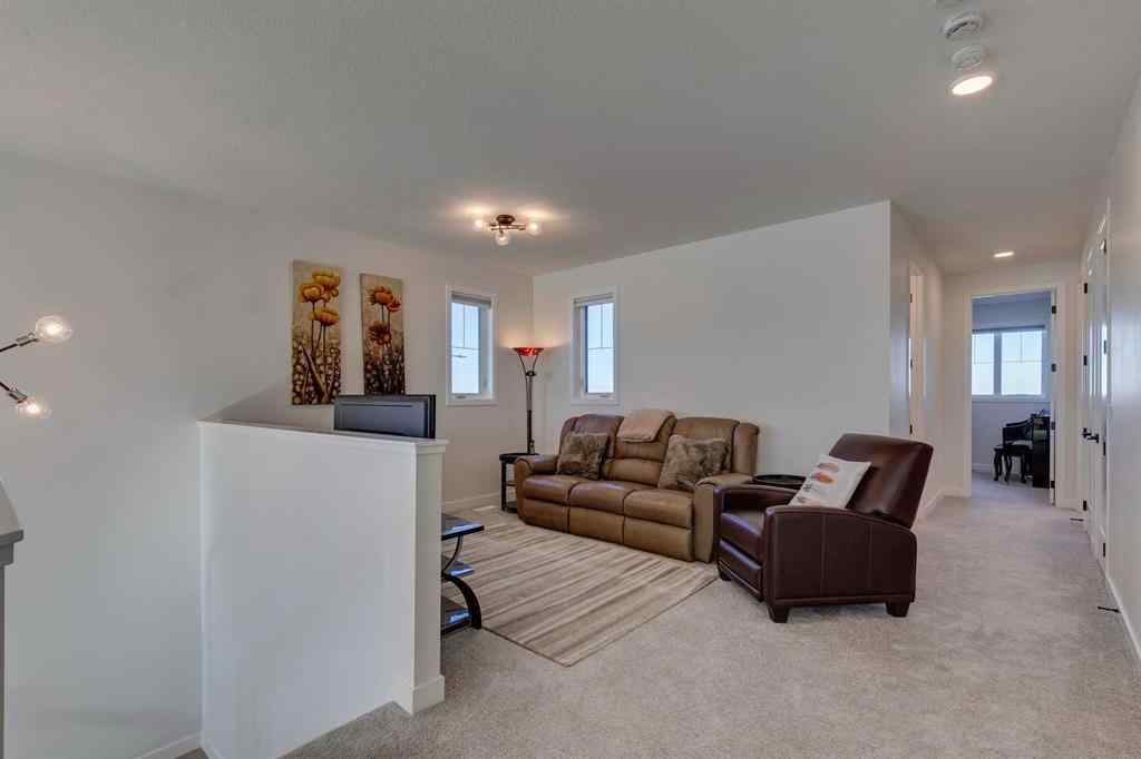 MLS® A2266458 - 794 Bluerock Way SW in Alpine Park Calgary, Residential