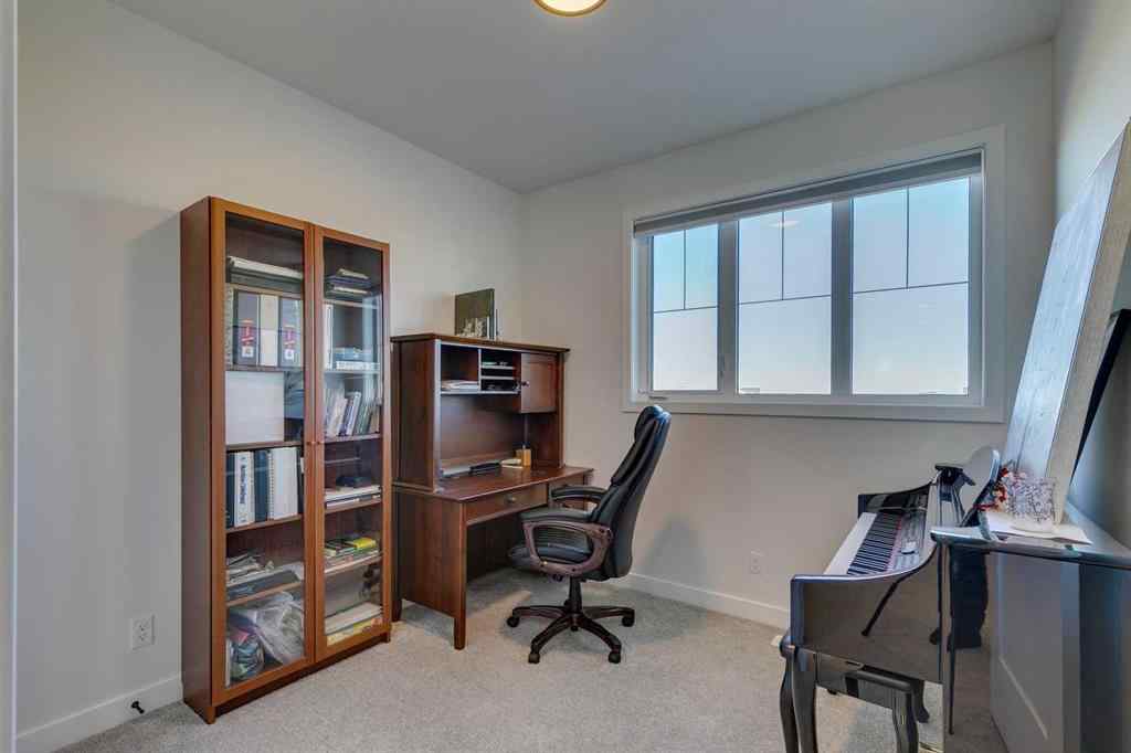 MLS® A2266458 - 794 Bluerock Way SW in Alpine Park Calgary, Residential