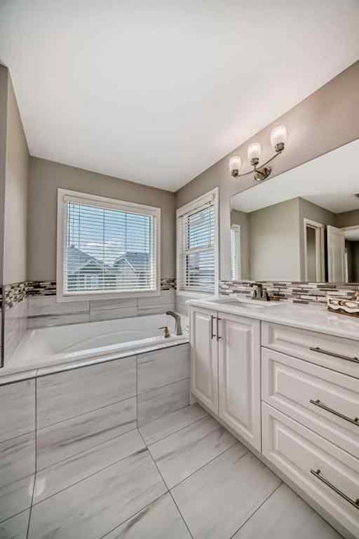 MLS® A2266460 - 226 West Grove Point SW in West Springs Calgary, Residential