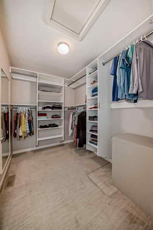 MLS® A2266460 - 226 West Grove Point SW in West Springs Calgary, Residential