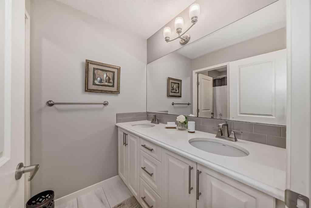 MLS® A2266460 - 226 West Grove Point SW in West Springs Calgary, Residential