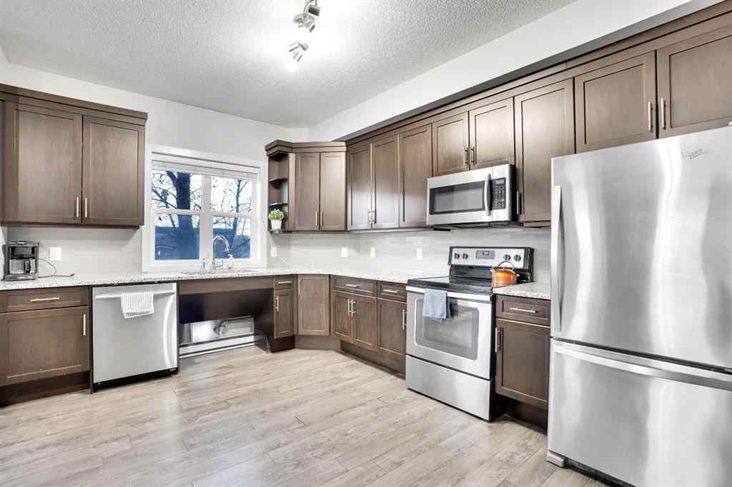 MLS® A2266461 - Unit #102 3 Taracove Estate Drive NE in Taradale Calgary, Residential
