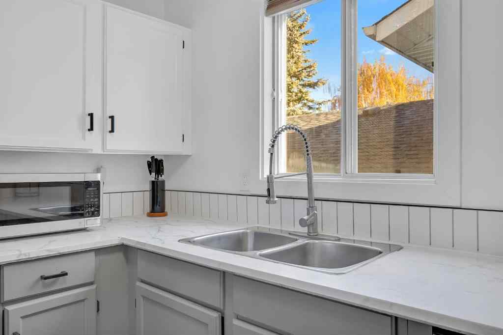 MLS® A2266468 - 91 Shawglen Way SW in Shawnessy Calgary, Residential