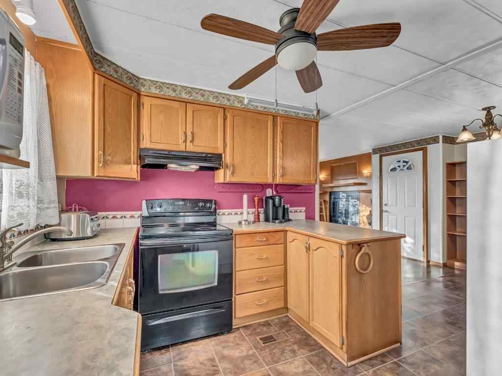 MLS® A2266474 - Unit #93 4000 13 Avenue SE in SE Southridge Medicine Hat, Mobile