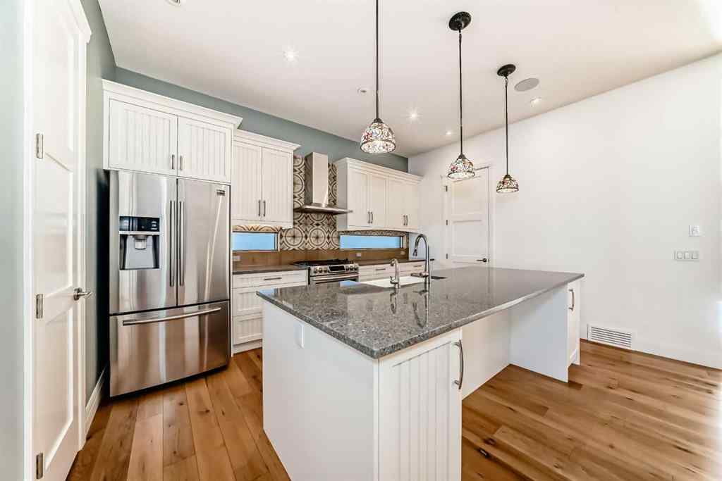 MLS® A2266479 - 2323 3 Avenue NW in West Hillhurst Calgary, Residential