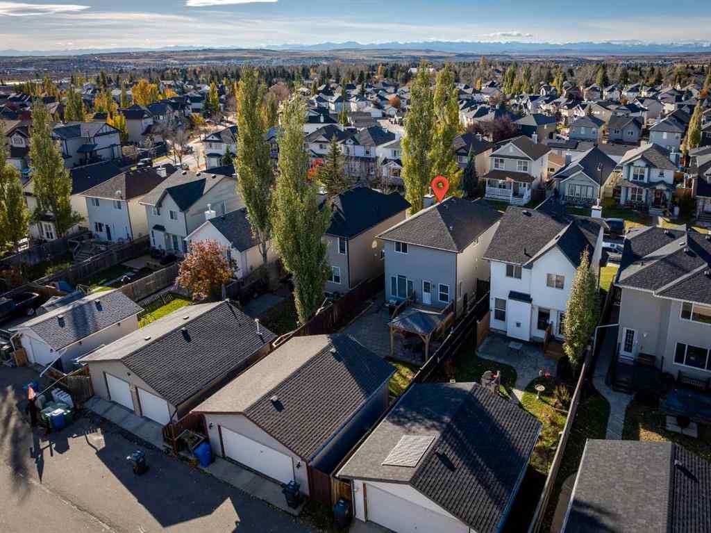 MLS® A2266485 - 85 Crystal Shores Crescent  in Crystal Shores Okotoks, Residential