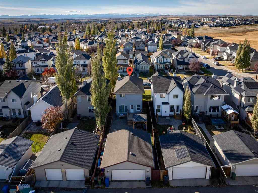 MLS® A2266485 - 85 Crystal Shores Crescent  in Crystal Shores Okotoks, Residential