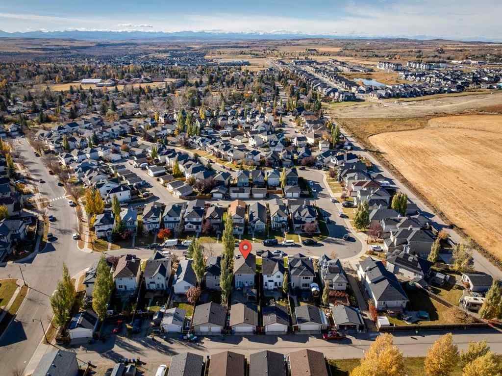 MLS® A2266485 - 85 Crystal Shores Crescent  in Crystal Shores Okotoks, Residential