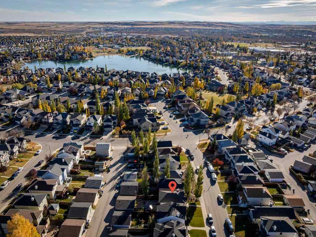 MLS® A2266485 - 85 Crystal Shores Crescent  in Crystal Shores Okotoks, Residential