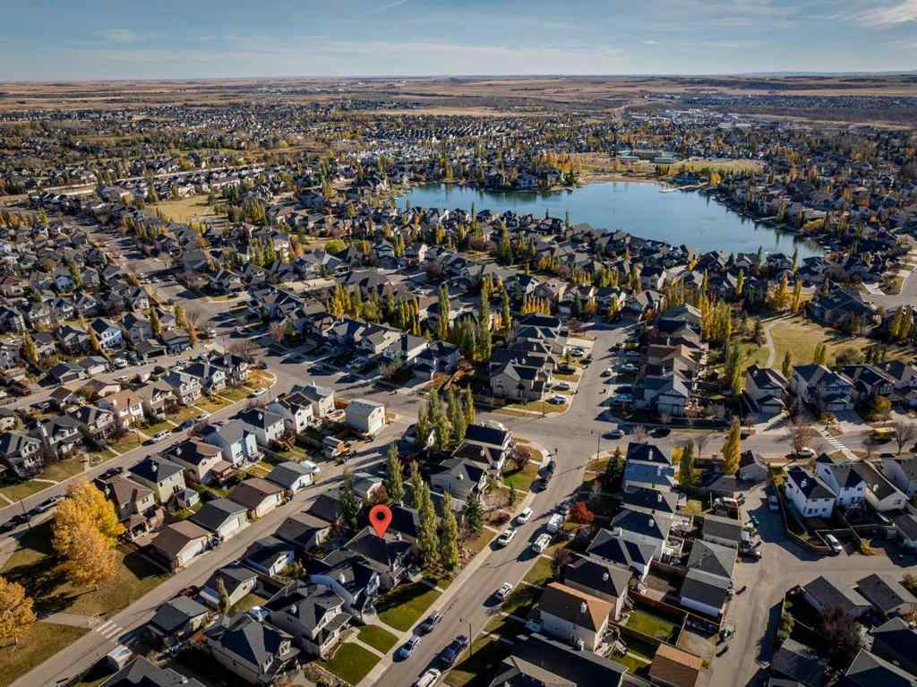 MLS® A2266485 - 85 Crystal Shores Crescent  in Crystal Shores Okotoks, Residential