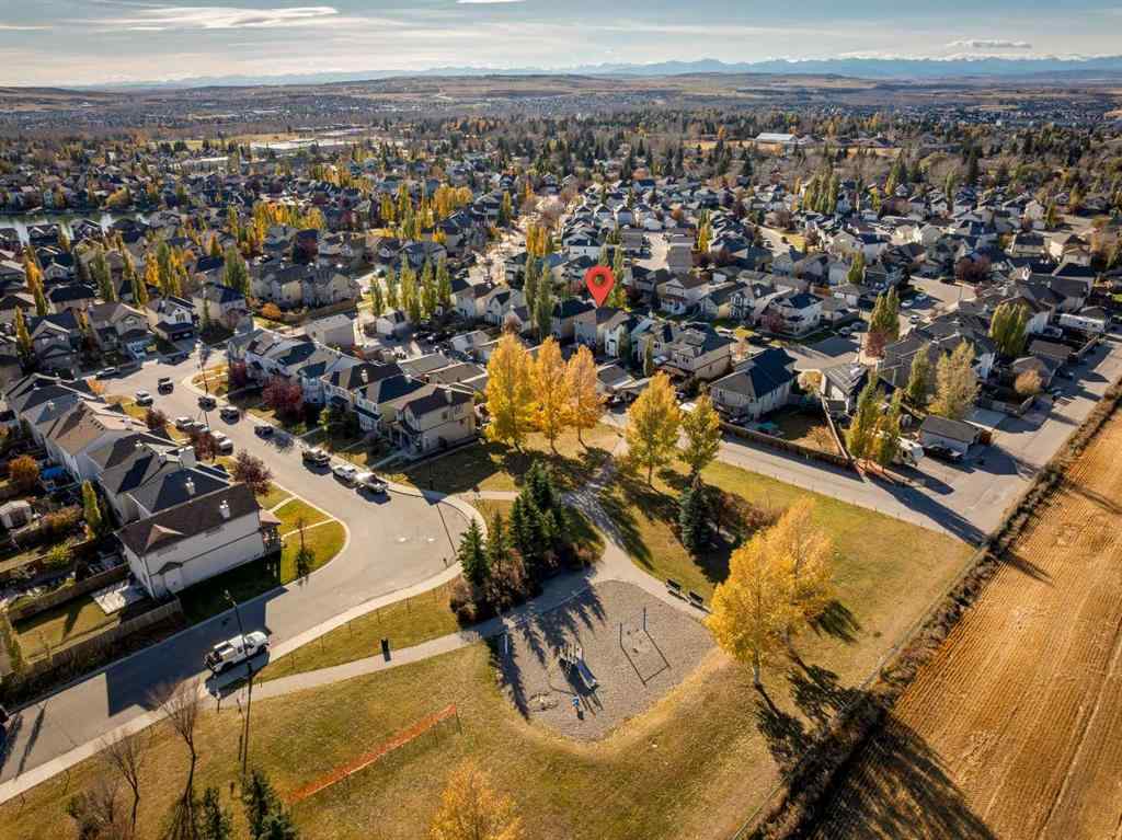 MLS® A2266485 - 85 Crystal Shores Crescent  in Crystal Shores Okotoks, Residential