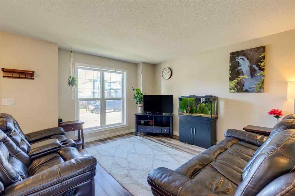 MLS® A2266485 - 85 Crystal Shores Crescent  in Crystal Shores Okotoks, Residential