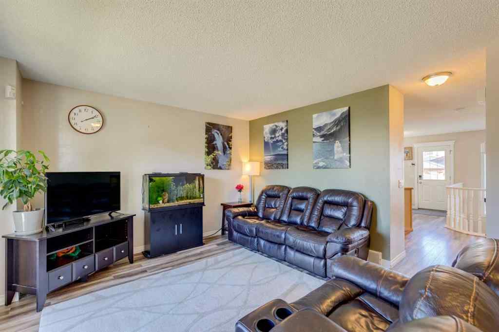 MLS® A2266485 - 85 Crystal Shores Crescent  in Crystal Shores Okotoks, Residential