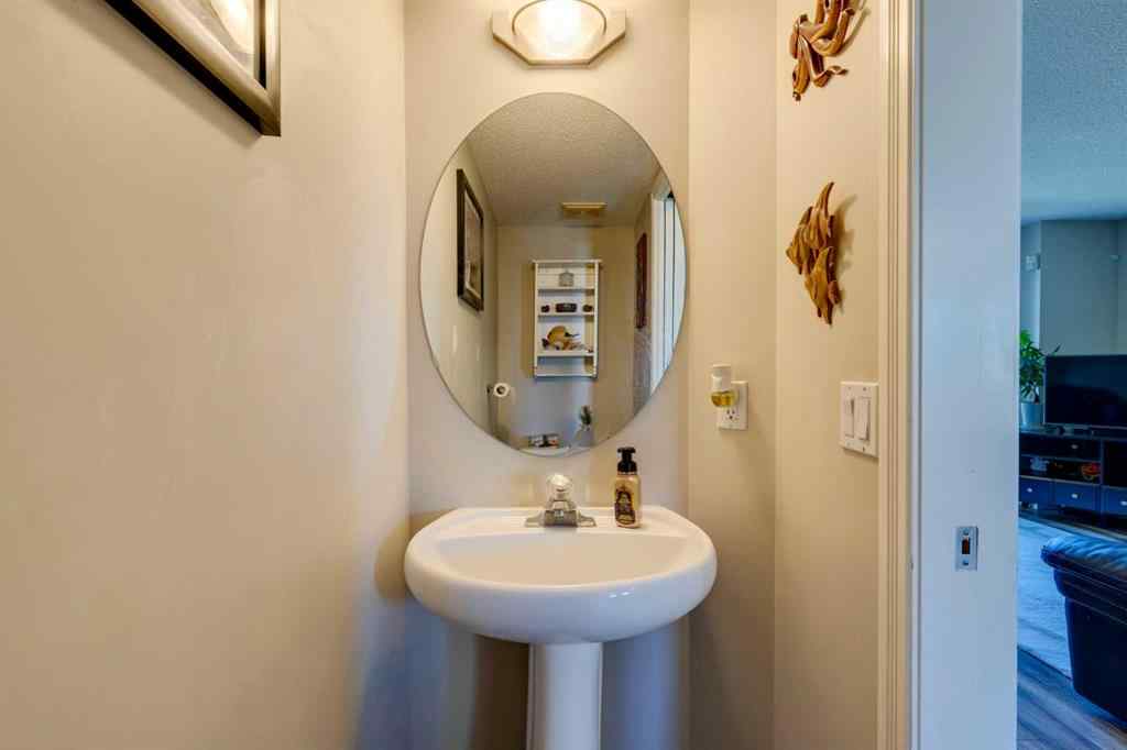 MLS® A2266485 - 85 Crystal Shores Crescent  in Crystal Shores Okotoks, Residential