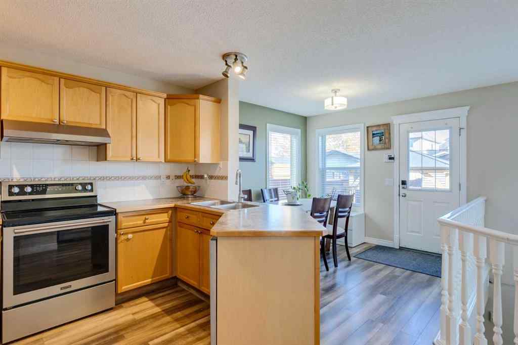 MLS® A2266485 - 85 Crystal Shores Crescent  in Crystal Shores Okotoks, Residential