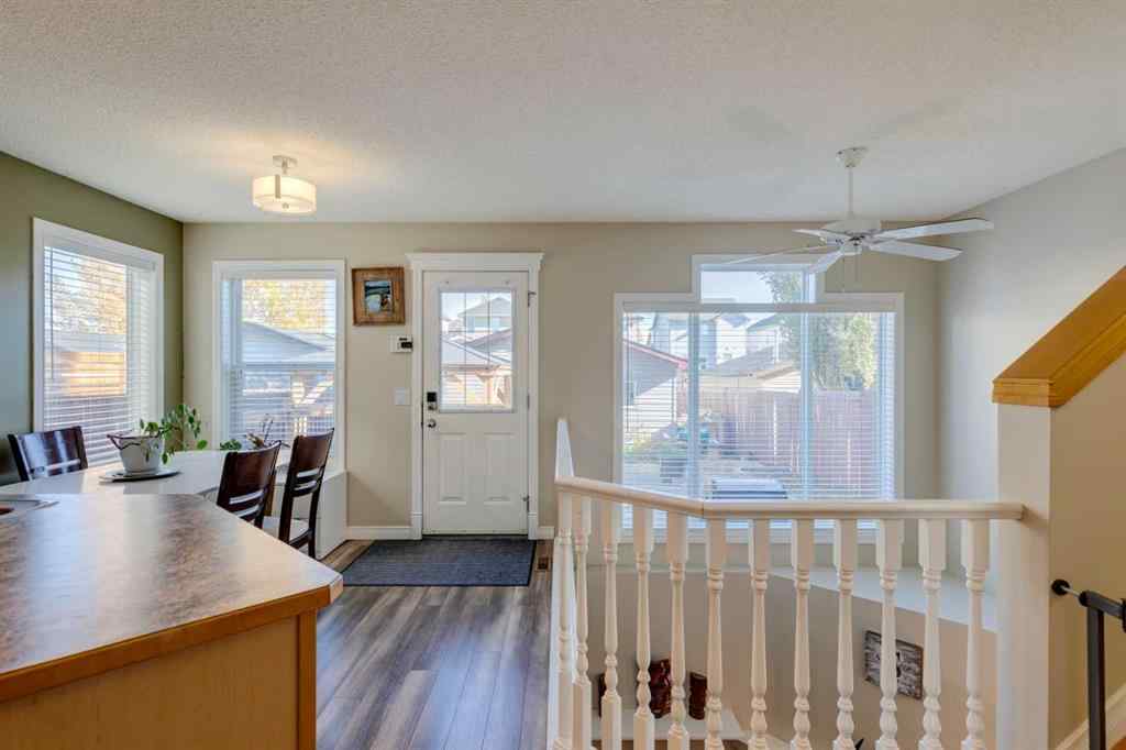 MLS® A2266485 - 85 Crystal Shores Crescent  in Crystal Shores Okotoks, Residential