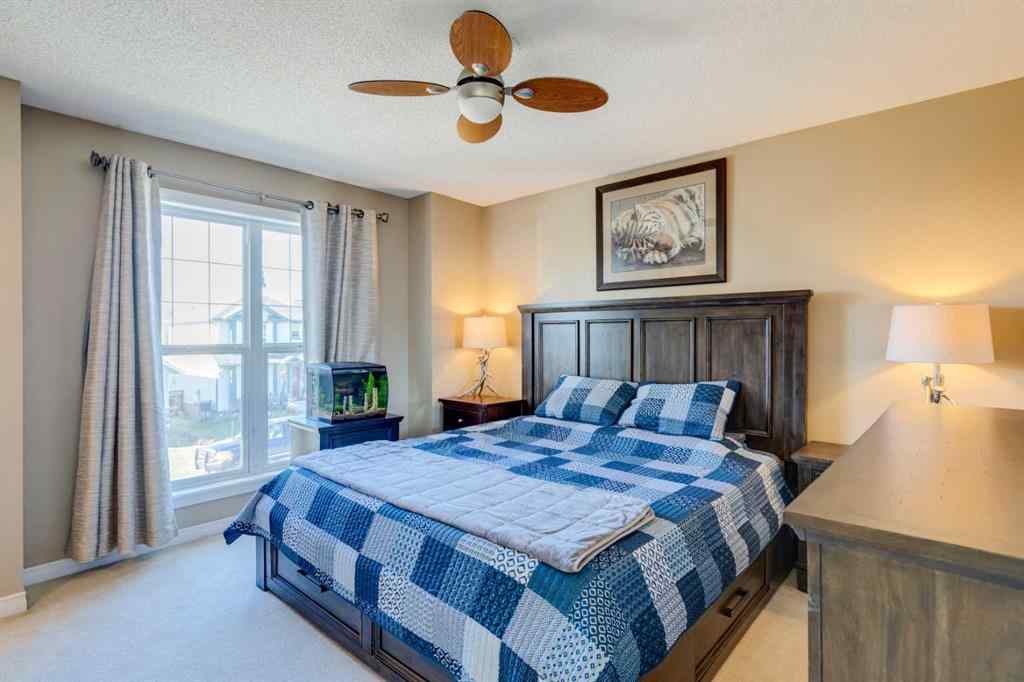MLS® A2266485 - 85 Crystal Shores Crescent  in Crystal Shores Okotoks, Residential