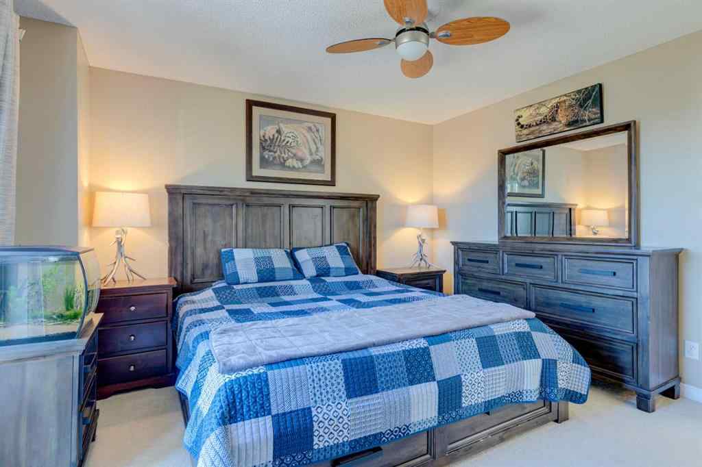 MLS® A2266485 - 85 Crystal Shores Crescent  in Crystal Shores Okotoks, Residential