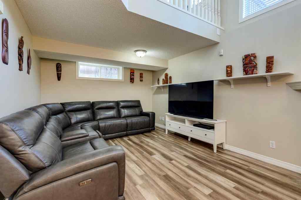 MLS® A2266485 - 85 Crystal Shores Crescent  in Crystal Shores Okotoks, Residential