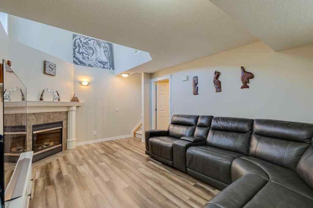MLS® A2266485 - 85 Crystal Shores Crescent  in Crystal Shores Okotoks, Residential