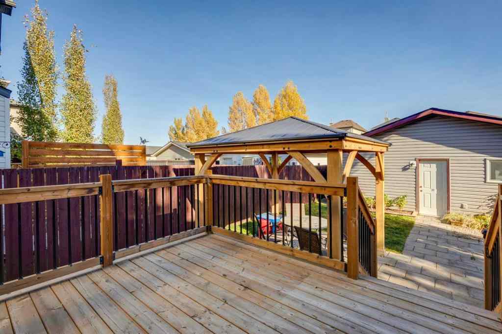 MLS® A2266485 - 85 Crystal Shores Crescent  in Crystal Shores Okotoks, Residential