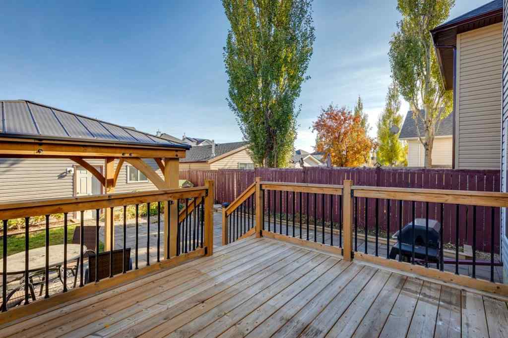 MLS® A2266485 - 85 Crystal Shores Crescent  in Crystal Shores Okotoks, Residential