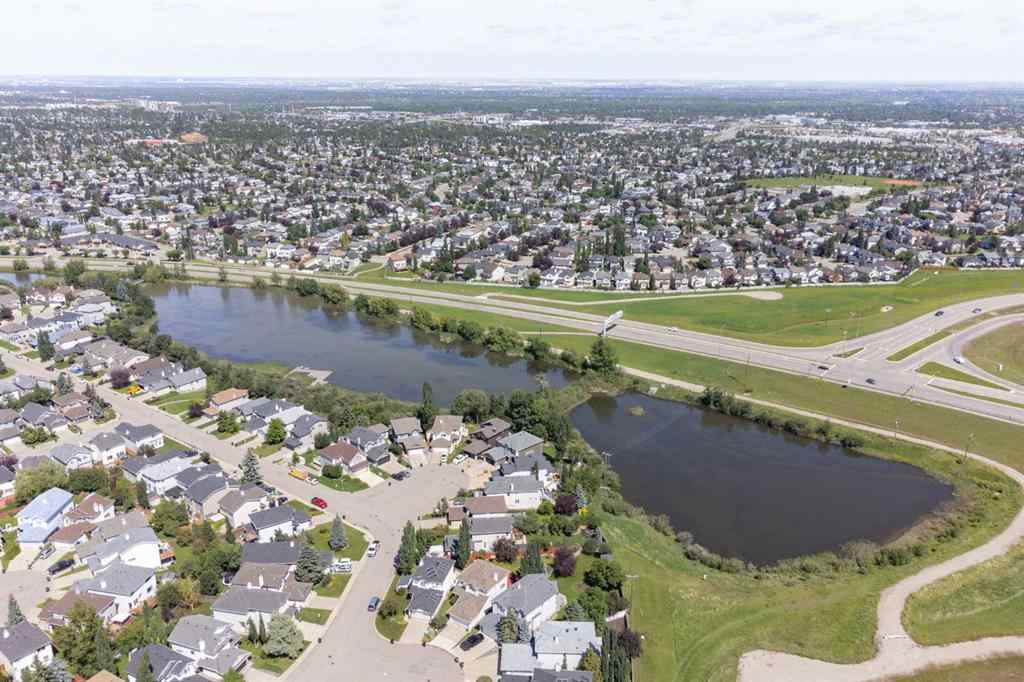 MLS® A2266488 - 122 Bridlewood Lane SW in Bridlewood Calgary, Residential