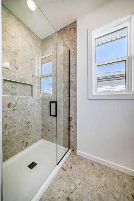 MLS® A2266517 - 52 Creekside Path SW in Pine Creek Calgary, Residential