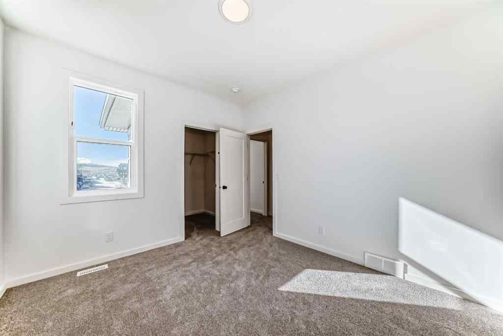 MLS® A2266517 - 52 Creekside Path SW in Pine Creek Calgary, Residential