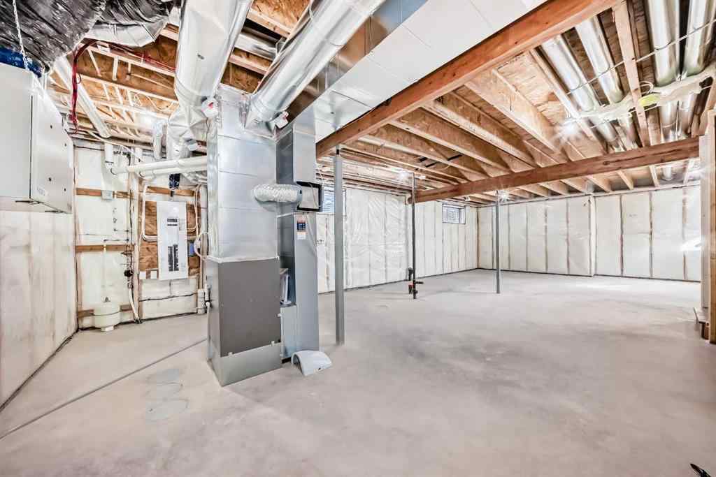 MLS® A2266517 - 52 Creekside Path SW in Pine Creek Calgary, Residential