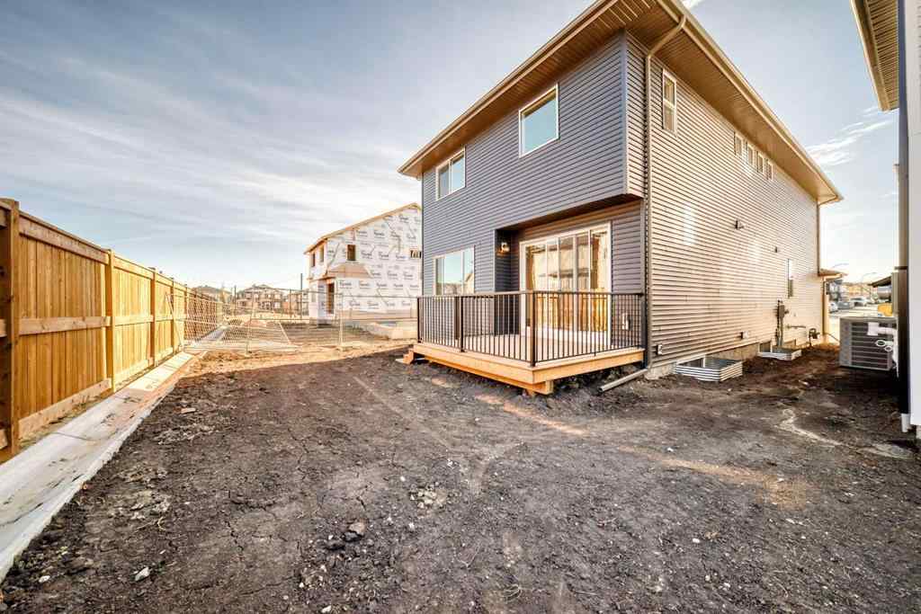 MLS® A2266517 - 52 Creekside Path SW in Pine Creek Calgary, Residential