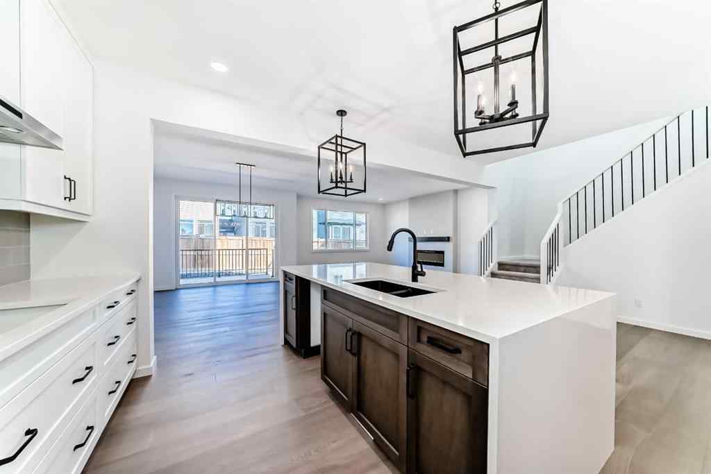 MLS® A2266517 - 52 Creekside Path SW in Pine Creek Calgary, Residential