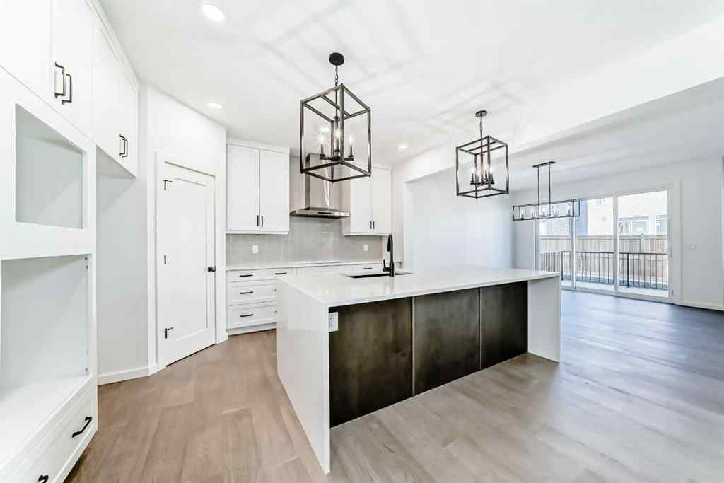 MLS® A2266517 - 52 Creekside Path SW in Pine Creek Calgary, Residential