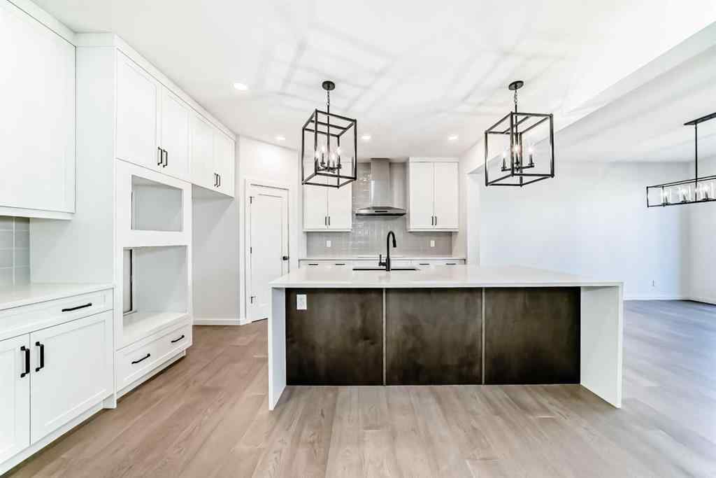 MLS® A2266517 - 52 Creekside Path SW in Pine Creek Calgary, Residential