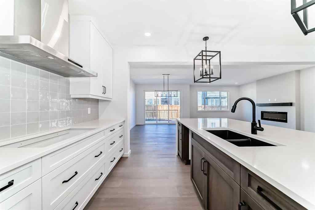 MLS® A2266517 - 52 Creekside Path SW in Pine Creek Calgary, Residential